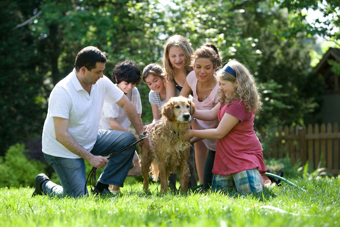 A family in the yard of the home they kept